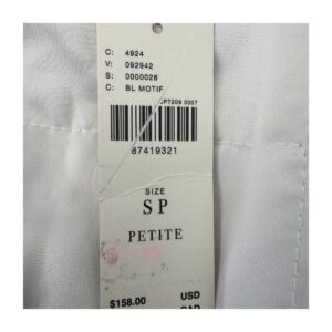 bomber corta floral by anthropologie, blanco con flores azul cobalto y mangas abullonadas