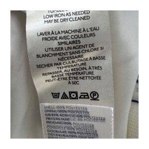 bomber corta floral by anthropologie, blanco con flores azul cobalto y mangas abullonadas