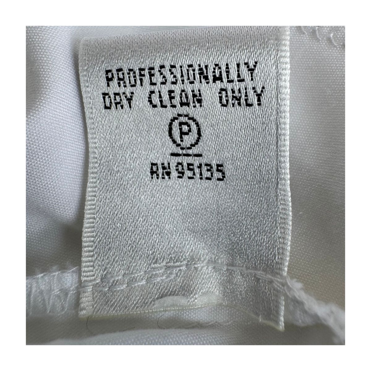 camisa blanca escultural lafayette 148 new york con textura diagonal y mangas entre tres cuartos y largas