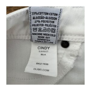 jeans blancos DL1961 modelo Cindy, corte bootcut, tono Milk, denim premium con tecnología 360 Comfort