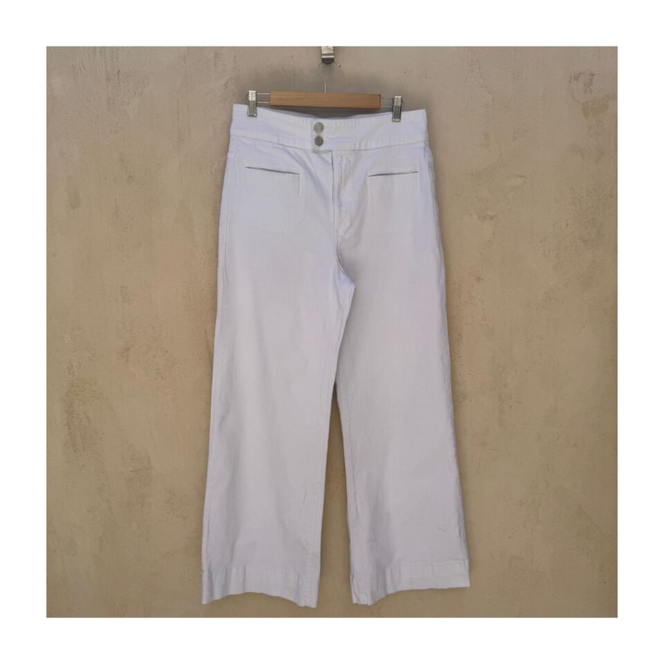 Frame Le Hardy Wide Leg blancos, talle alto, caída amplia arquitectónica