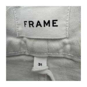 Frame Le Hardy Wide Leg blancos, talle alto, caída amplia arquitectónica