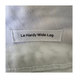 Frame Le Hardy Wide Leg blancos, talle alto, caída amplia arquitectónica