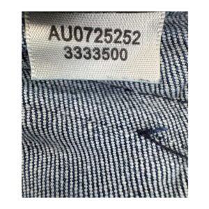 jeans flare inspiración setentas talla 25 en denim azul con bolsillos artesanales de 7 for All Mankind, silueta alargada y estilo atemporal
