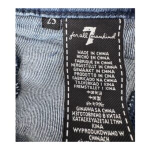 jeans flare inspiración setentas talla 25 en denim azul con bolsillos artesanales de 7 for All Mankind, silueta alargada y estilo atemporal