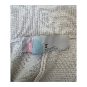 jogger Treya Knit de segunda manoen punto marfil con mezcla lino y silueta oversize de Free People, talla XL. Moda circular, ropa usada