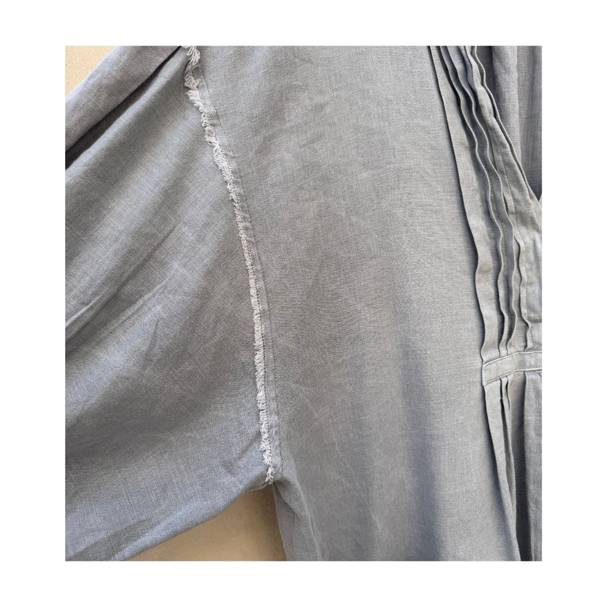 romper gris free people lino lyocell con pliegues y bolsillos oversized