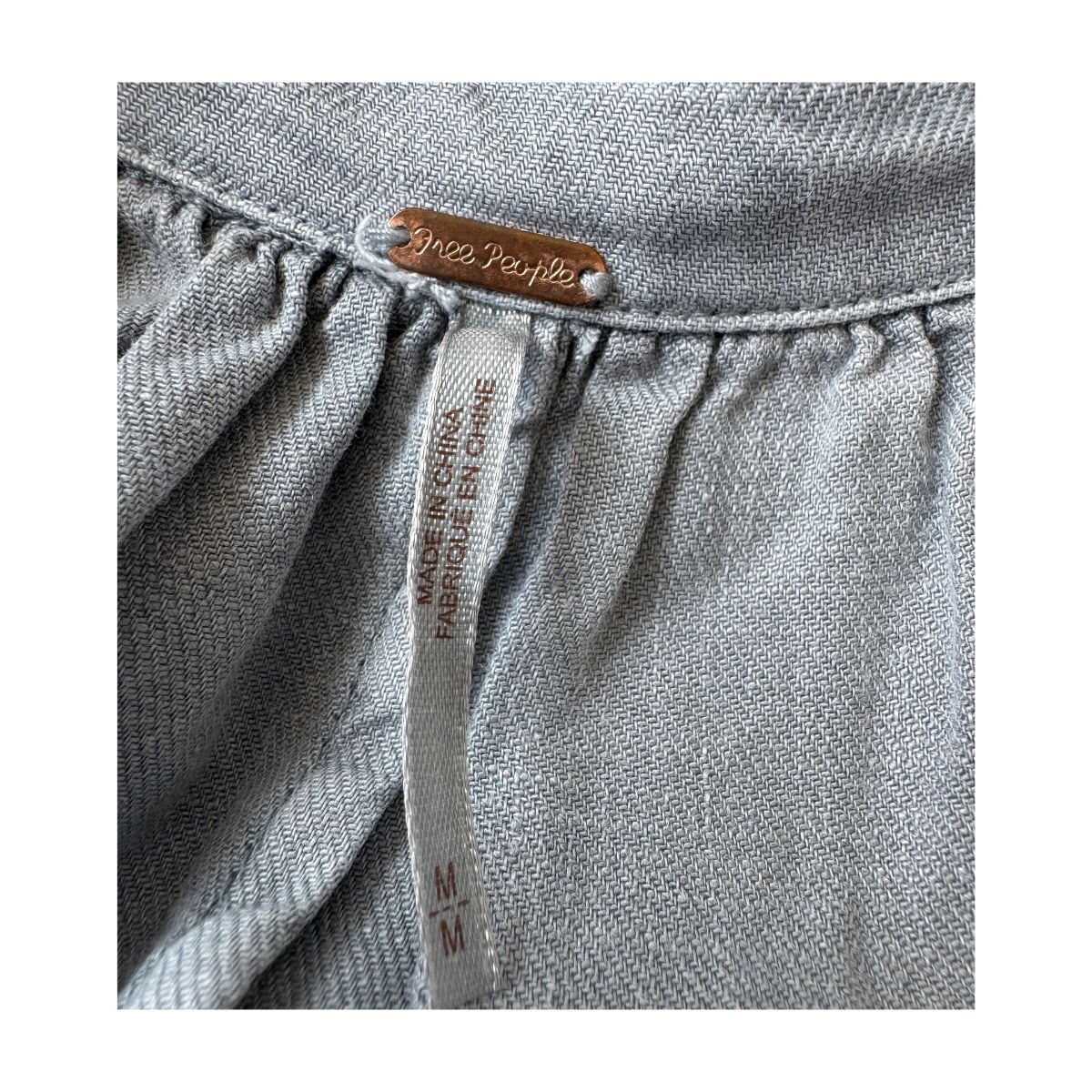 romper gris free people lino lyocell con pliegues y bolsillos oversized