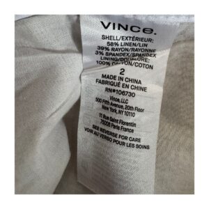 Shorts Vince en lino blanco con corte clásico minimalista, doble botonadura, bolsillos parche y forro de algodón – talla 2