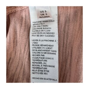 T-shirt You Rock de Free People color durazno, corte crop relajado y costuras visibles, talla S, ropa usada, de segunda mano