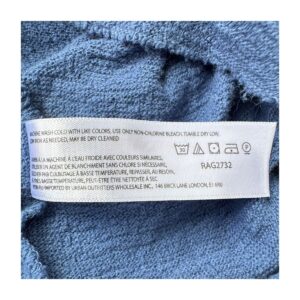 blusa de segunda mano curado por Amelie.100% algodón azul índigo free people estilo oversized con botones y escote en v