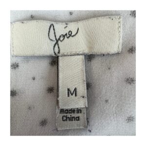 Blusa Joie puntos y estrellas negros en fondo blanco. Talla M, estilo soft girl
