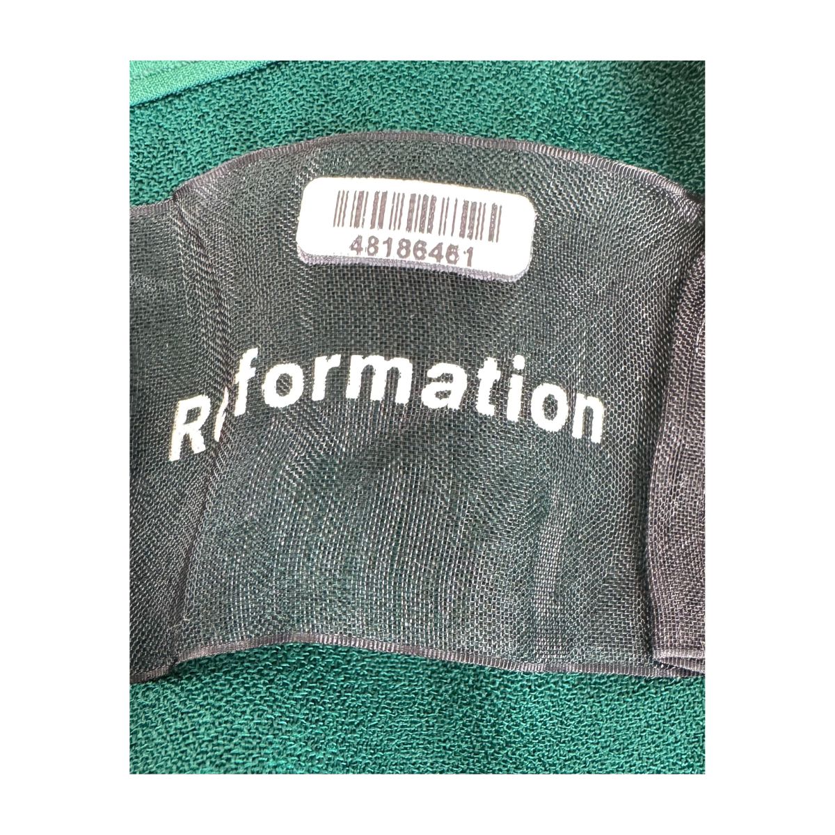 Mono largo verde esmeralda de Reformation con silueta palazzo, mangas abullonadas y espalda descubierta con lazada, talla 4. segunda mano