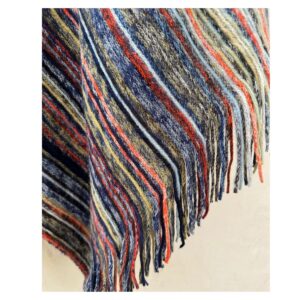 Poncho tejido multicolor con cuello alto y flecos talla única. Estilo boho chic