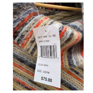 Poncho tejido multicolor con cuello alto y flecos talla única. Estilo boho chic