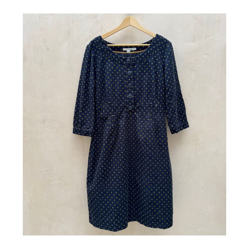 Vestido de segunda mano Boden de pana azul marino con lunares chartreuse, botones frontales y manga 3/4, talla 12