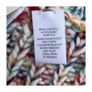 Bufanda infinita de Loft. En punto acanalado con explosión multicolor controlada. Aesthetic soft winter que fusiona arte abstracto y confort urbano.