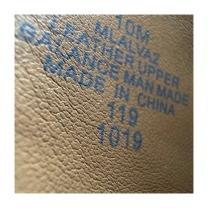 Yale Bootie Marc Fisher, Piel acabado pitón tañña 10 US y estilo western minimal, guardarropa cápsula.