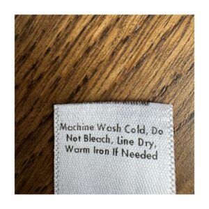 Falda plisada Lucy beige corta en Tencel. Talla S