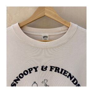 Pullover Uniqlo colaboración Peanuts en 100% algodón